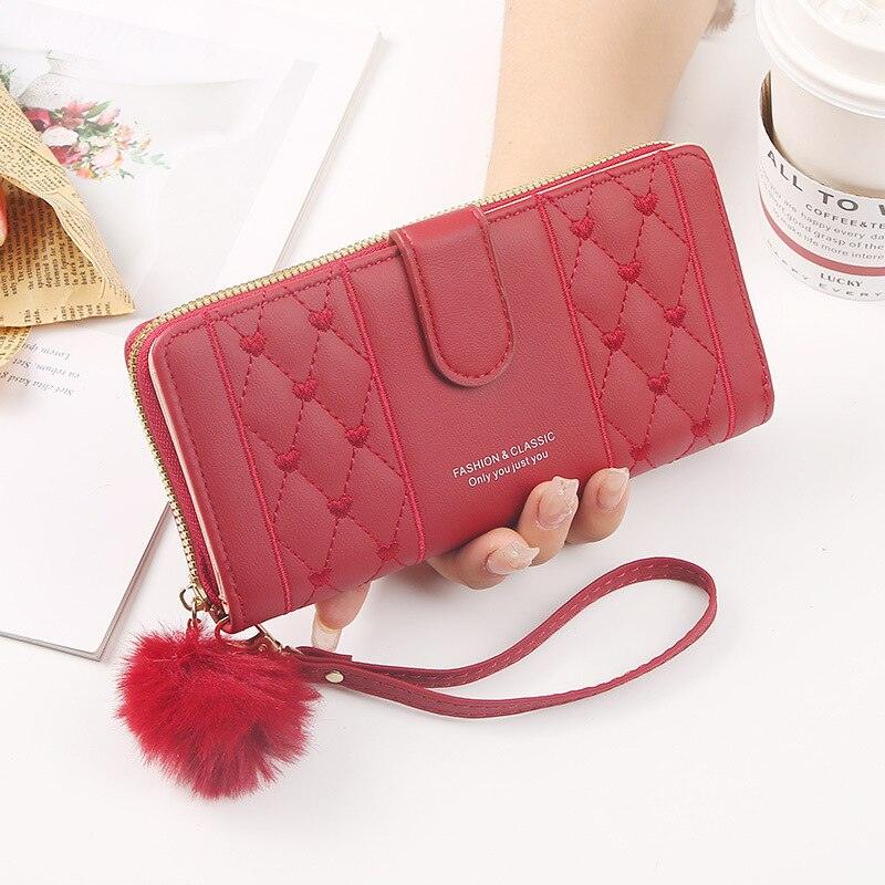 Cartera Bordada Puffer Lilie en Cuero