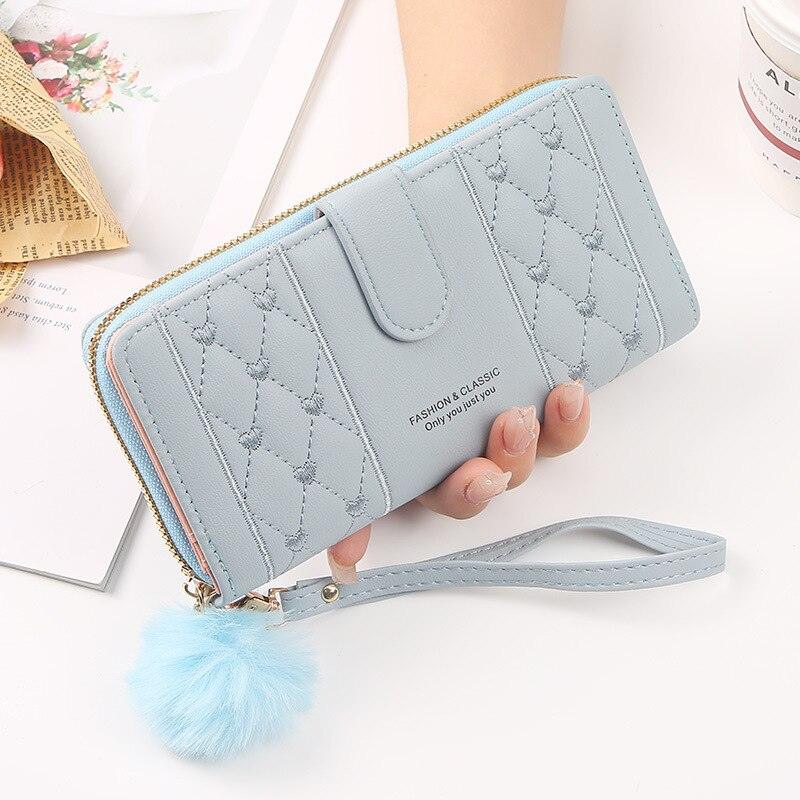 Cartera Bordada Puffer Lilie en Cuero